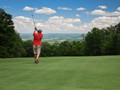Golfer-scenic view-ball in flight